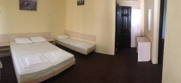 Фото номера Апартаменты с 2 спальнями Мини-отель Guest house Meka г. Гудаута 3