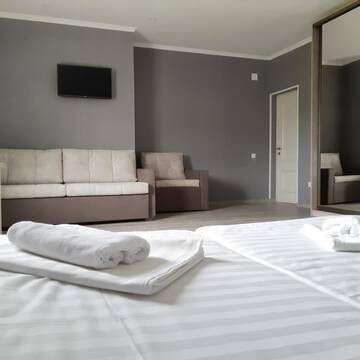 Фото номера Семейный номер с видом на горы Отель Injir Village Hotel г. Гудаута 5