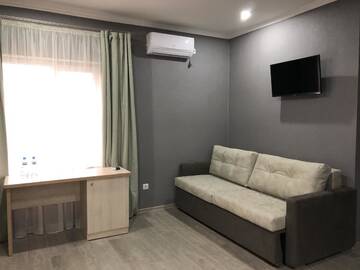 Фото номера Семейный номер с видом на горы Отель Injir Village Hotel г. Гудаута 3