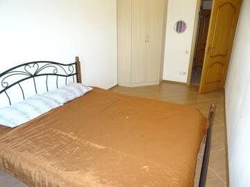 Фото номера Семейный номер с видом на сад Гостевой дом Magnolia Guest House г. Гудаута 2