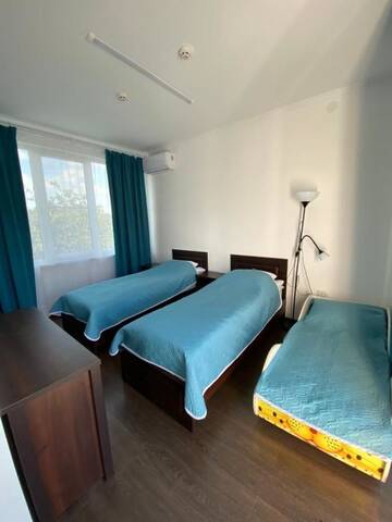 Фото номера Двухместный номер Делюкс с 2 отдельными кроватями Отель Family Resort Bambora г. Гудаута 6