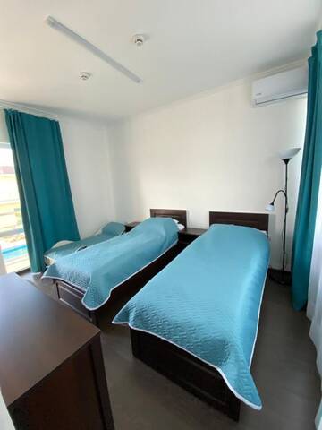 Фото номера Двухместный номер Делюкс с 2 отдельными кроватями Отель Family Resort Bambora г. Гудаута 9