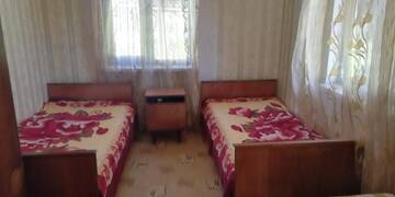 Фото номера Бюджетный двухместный номер с 2 отдельными кроватями Проживание в семье Комнаты в частном доме г. Гудаута 8