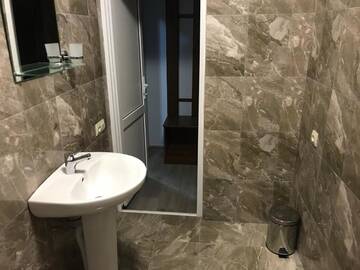 Фото номера Трехместный номер Гостевой дом Gudauta г. Гудаута 4